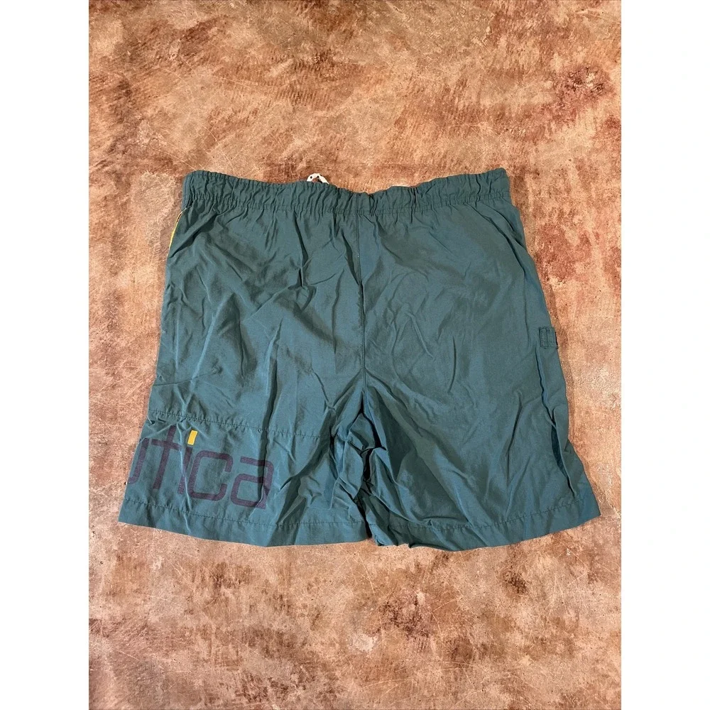 Vintage Nautica Boys S 8-10 Solid Green Nylon Mesh Lined Swim Trunks‎ Logo
